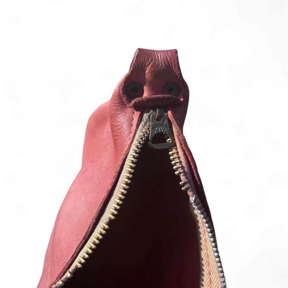 Red - brown leather pouch